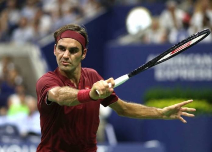 NEW YORK, NY - AUGUST 28: Roger Federer of Switzerland returns the ball during his men's singles first round match against Yoshihito Nishioka of Japan on Day Two of the 2018 US Open at the USTA Billie Jean King National Tennis Center on August 28, 2018 in the Flushing neighborhood of the Queens borough of New York City. Matthew Stockman/Getty Images/AFP