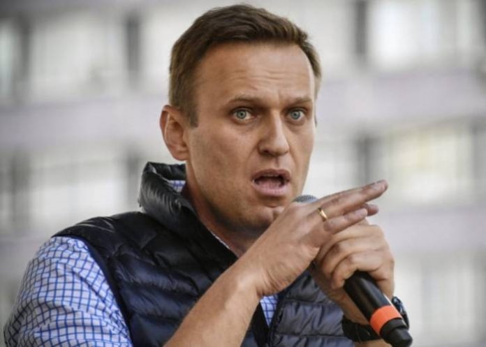 (FILES) In this file photo taken on April 30, 2018 Russian opposition leader Alexei Navalny speaks during an opposition rally in central Moscow to demand internet freedom in Russia. Russian opposition leader Alexei Navalny was detained outside his home on August 25, 2018 for reasons that were not immediately clear, his spokeswoman said on Twitter.