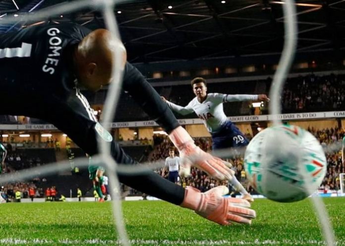 Tottenham’s Dele Alli scores the winning penalty in the shootout past Watford’s Heurelho Gomes in the city where the England midfielder was born. Eddie Keogh-Reuters