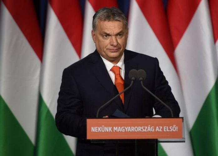 (FILES) In this file photo taken on February 18, 2018 Hungarian Prime Minister and Chairman of FIDESZ party Viktor Orban delivers his state of the nation address in front of his party members and sympathizers at Varkert Bazar cultural center of Budapest. With his fierce rhetoric and anti-immigration measures, Hungary's Prime Minister Viktor Orban has alarmed critics at home and in Europe, while bolstering his populist domestic support and attracting far-right fans internationally. Orban, 55, defends his government's record in Strasbourg on September 11, 2018, ahead of a European Parliament vote on a report that says Hungary presents a risk of a