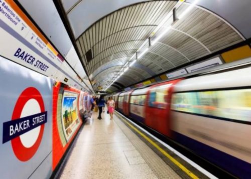 Family hide as London Tube train passes over them