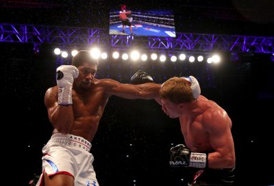 Joshua Knocks Povetkin Out To Defend World Titles