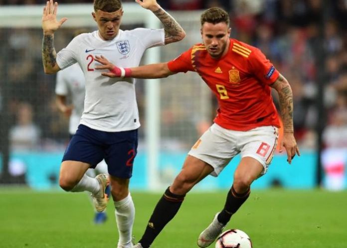 England's defender Kieran Trippier (L) vies with Spain's midfielder Saul Niguez during the UEFA Nations League football match between England and Spain at Wembley Stadium in London on September 8, 2018. Glyn KIRK - AFP