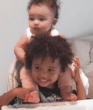 Kim Kardashian Posts Snap Of Saint West Holding Chicago On His Shoulders