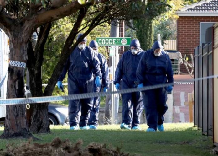 Forensic police inspect a property in Bedford, Perth, where up to five bodies were discovered. Richard Wainwright-AAP