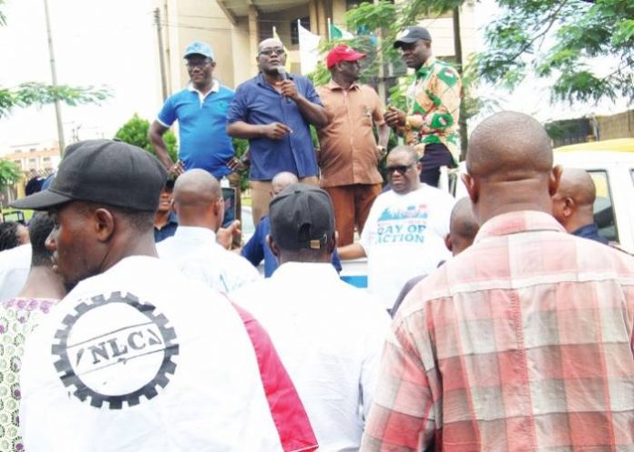 Main gate of the Lagos State Secretariat, Alausa under lock and key, as the Nigeria Labour Congress (NLC) began nationwide strike in Lagos…yesterday