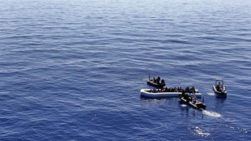 Two dead, 16 rescued after migrant boat capsizes